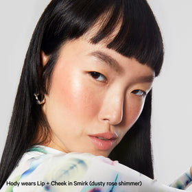 Milk Makeup Lip + Cheek Stick displayed with other Milk Makeup products