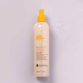 milk_shake Leave-In Conditioner application on hair