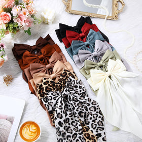 Mimorou satin hair bows arranged in a colourful pattern