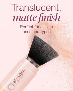 Mineral Fusion Brush-On Powder Sunscreen in use on face