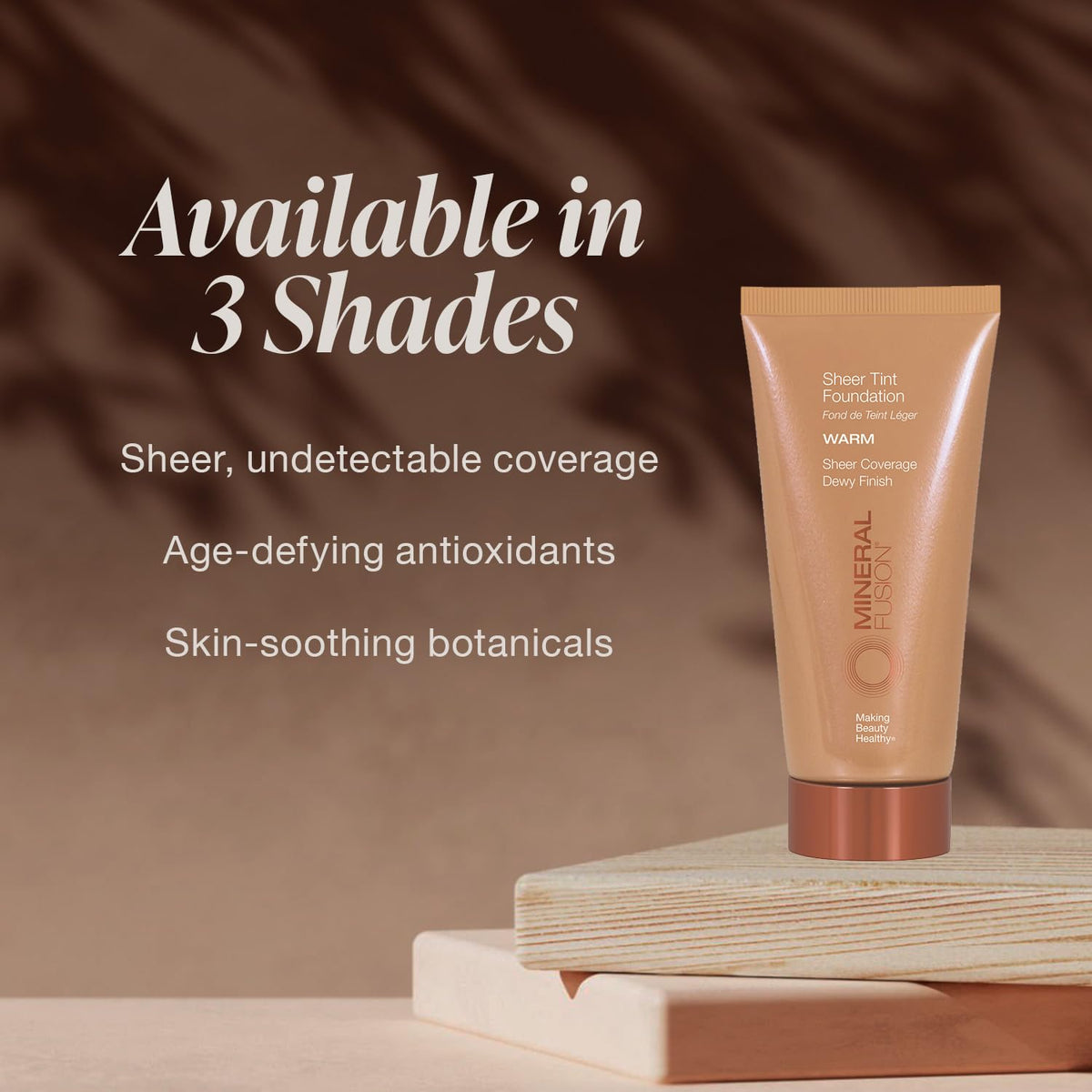 Mineral Fusion Sheer Tint Foundation Olive on a vanity