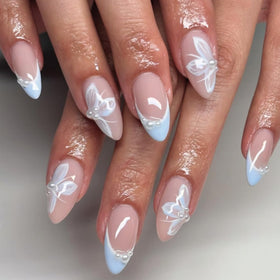 Mivota Blue French Tip Almond Press On Nails front view with butterflies