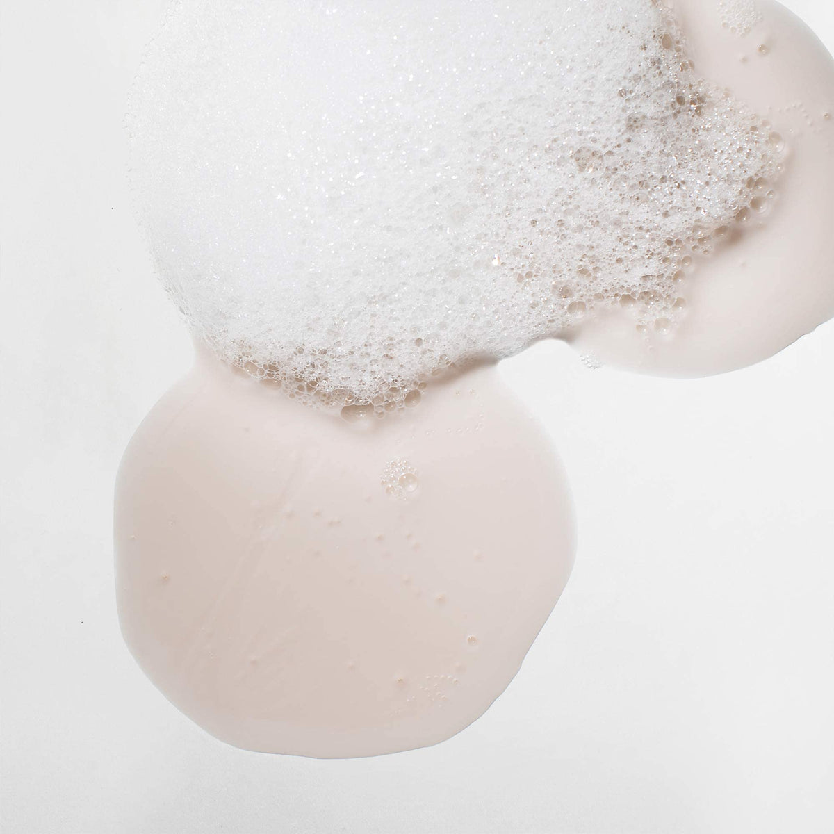 Mizani Strength Fusion Shampoo lathering in hands