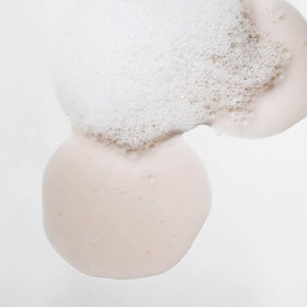 Mizani Strength Fusion Shampoo lathering in hands