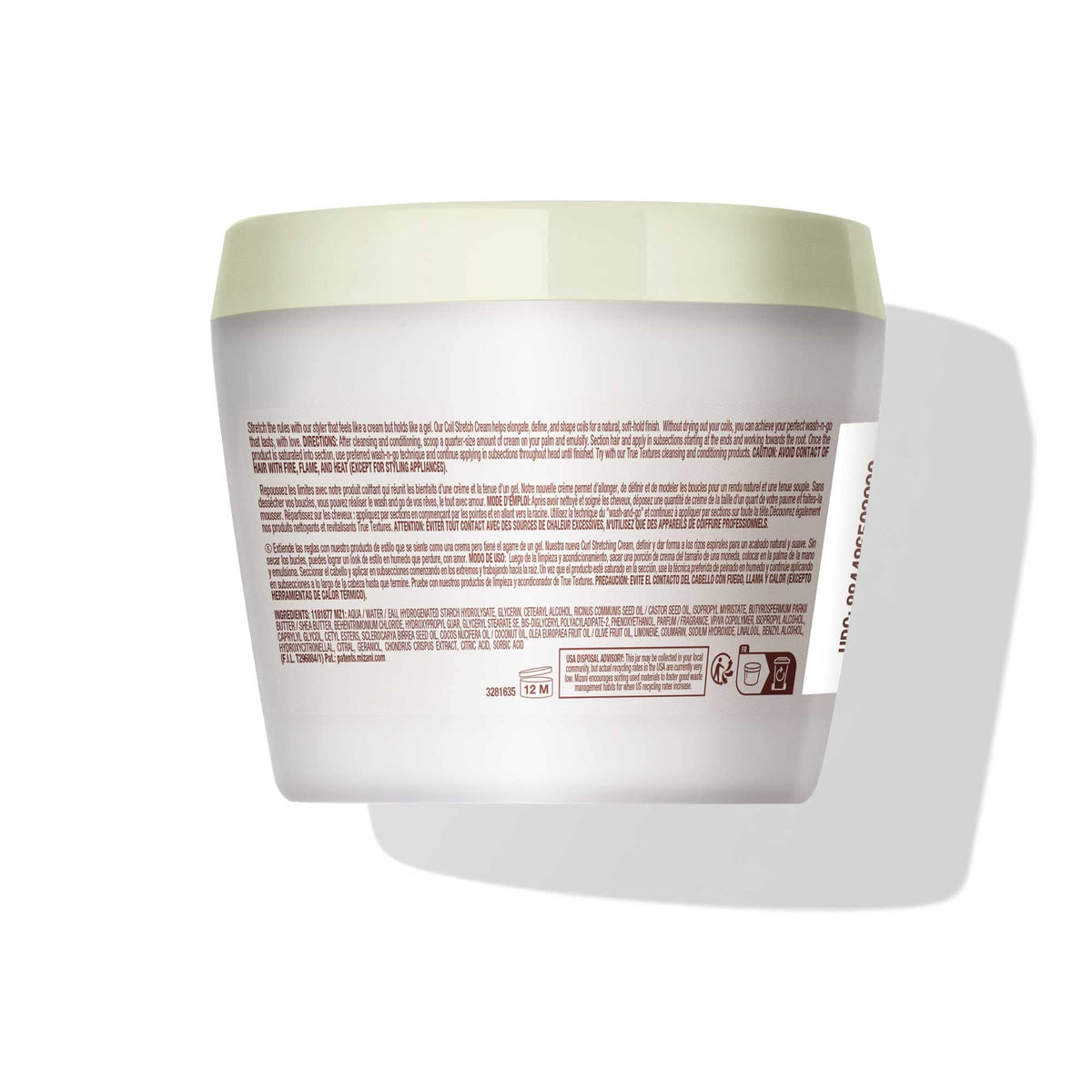 Mizani True Textures Coil Stretch Cream in use on coily hair