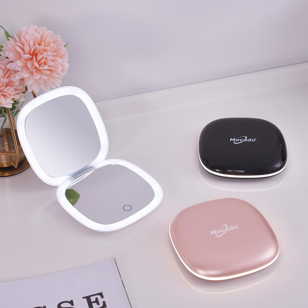 Mocado Compact Mirror displayed on a vanity table