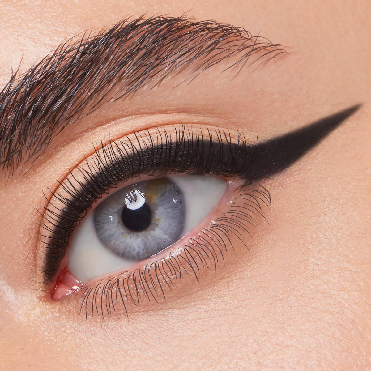 Model applying ColourPop BFF Crème Gel Liner