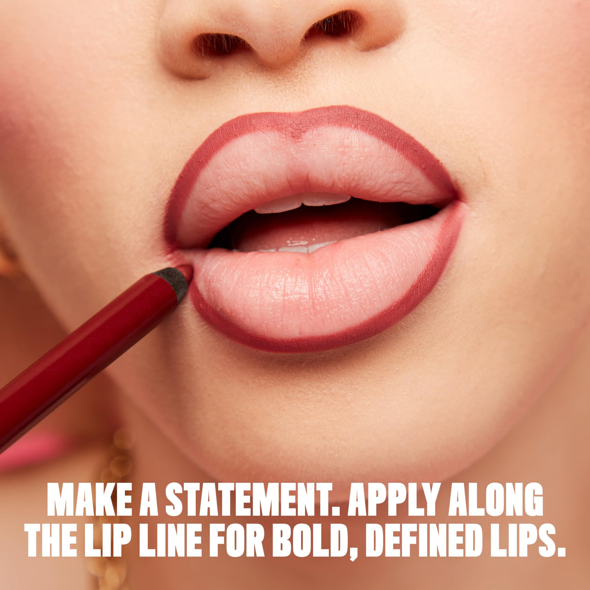Model applying NYX Line Loud Lip Liner on lips
