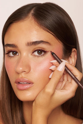 Model applying PERSONA Waterproof Eyeliner
