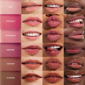 Model applying Tower 28 ShineOn Lip Gloss Jelly Cashew