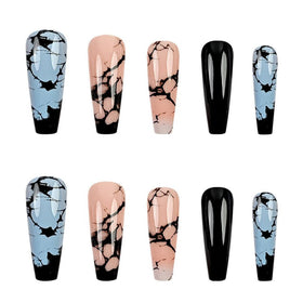 Model showcasing juggssa Press On Nails in a social setting