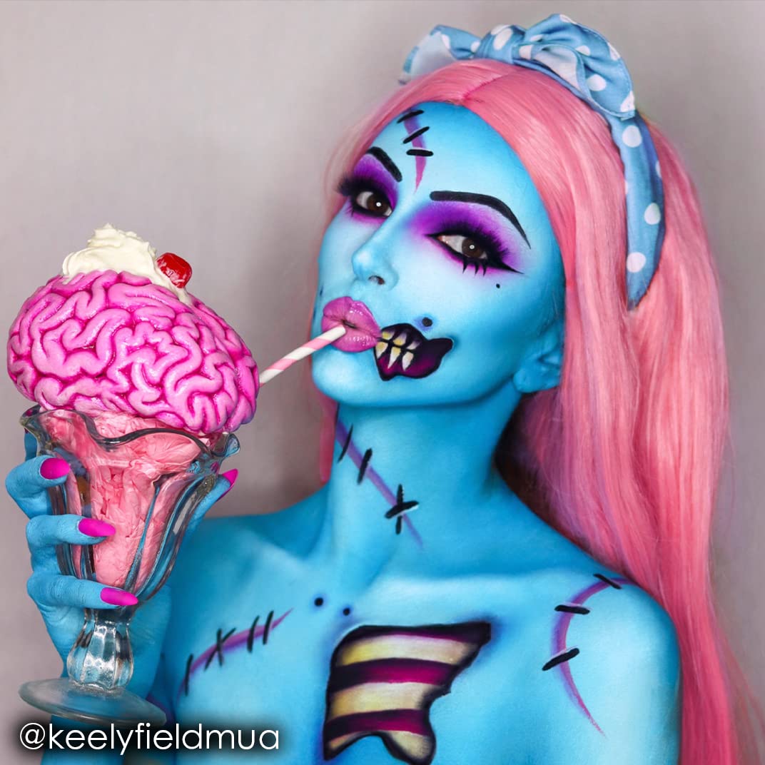 Model using Mehron Light Blue body paint for cosplay