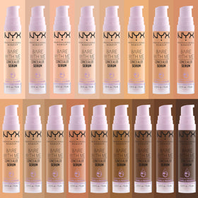Model using NYX Bare With Me Concealer Serum during makeup application