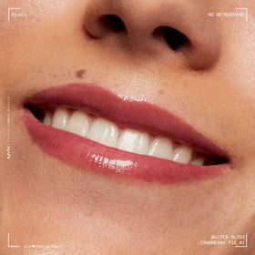 Model wearing NYX Butter Gloss Cranberry Pie