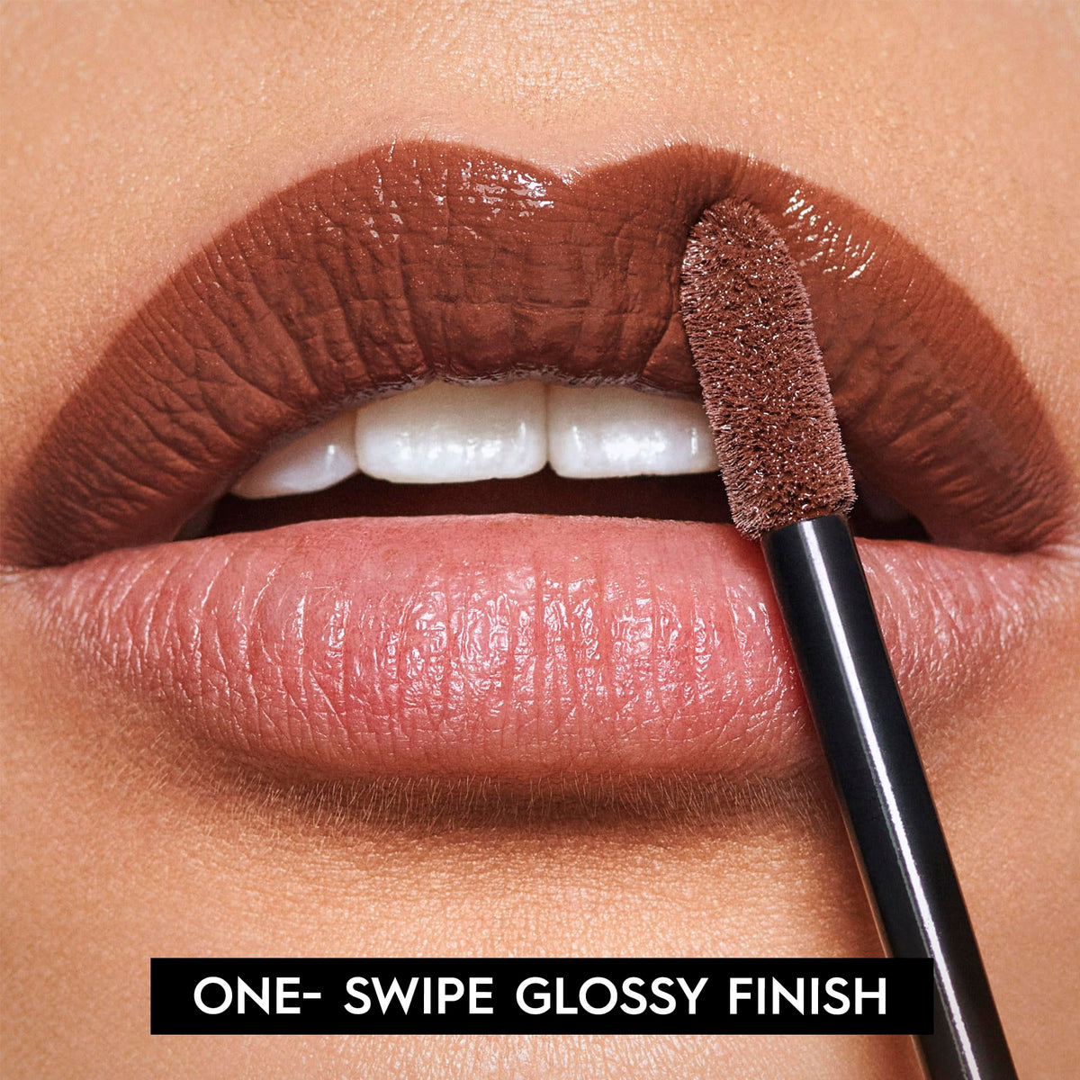 Model wearing URBAN DECAY Vice Lip Bond Lipstick Toffee Nude