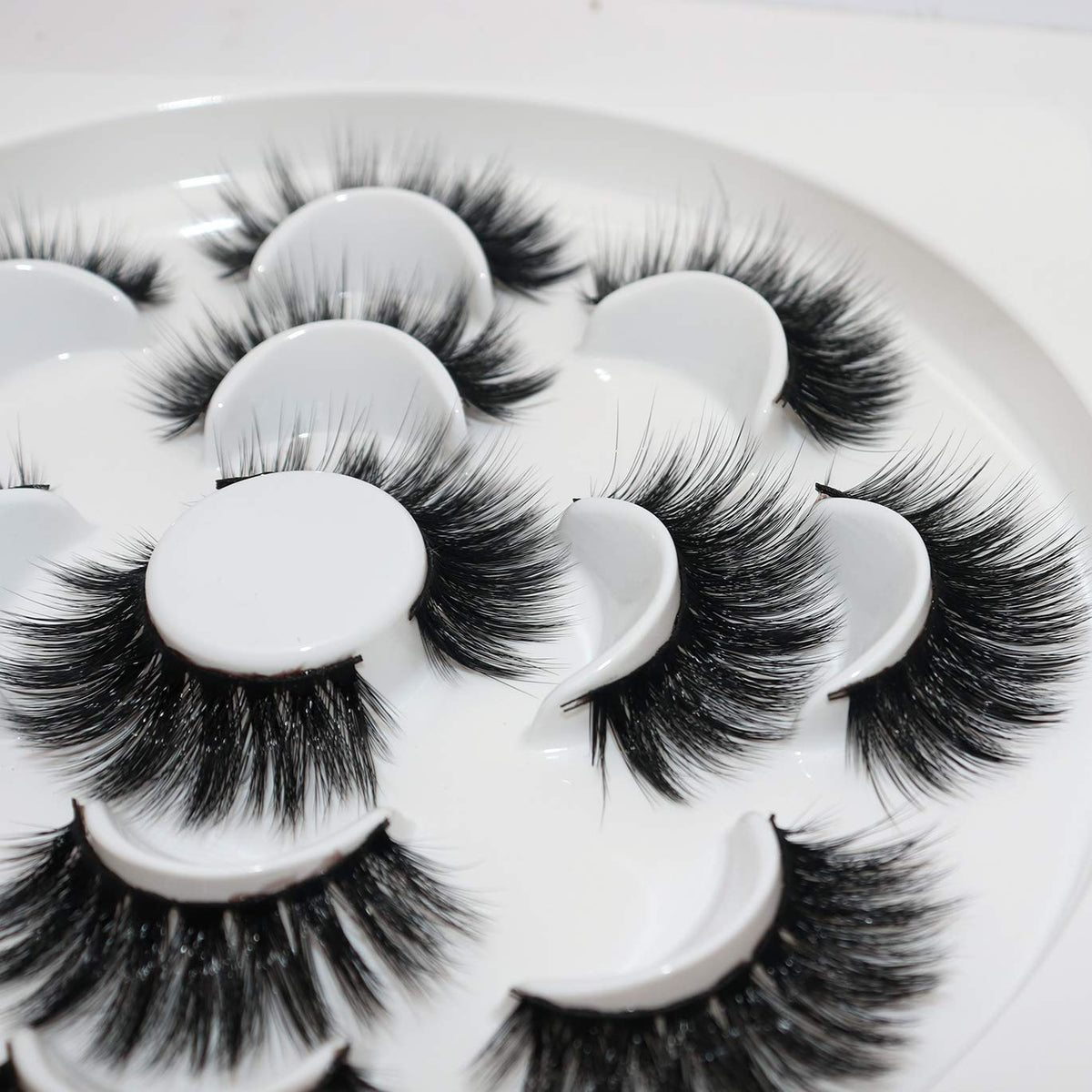 Model wearing Veleasha 5D Faux Mink False Eyelashes at a party