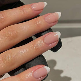 modelones French Tip Press On Nails showing different sizes