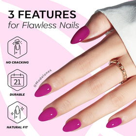 modelones Fuchsia Press On Nails displayed on a hand