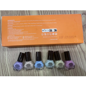 modelones nail polish set with a festive background