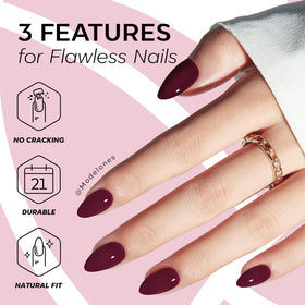 modelones Plum Purple Press On Nails in use on a hand