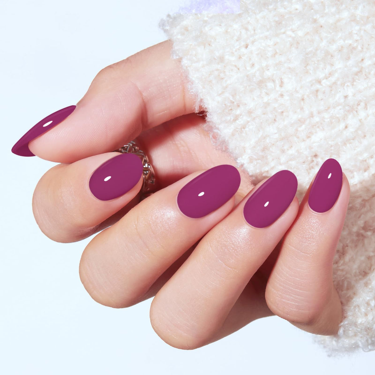 modelones Plum Short Press on Nails Kit showing included nail glue and adhesive tabs