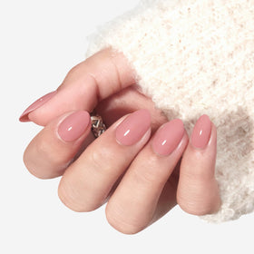 modelones Soft Pink Short Press on Nails Kit showing nail adhesive tabs and glue