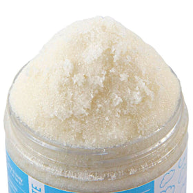 Mojo Spa Face and Body Scrub showing the clear plastic jar
