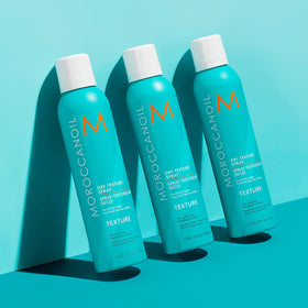 Moroccanoil Dry Texture Spray 5.4 Fl. Oz. in hand