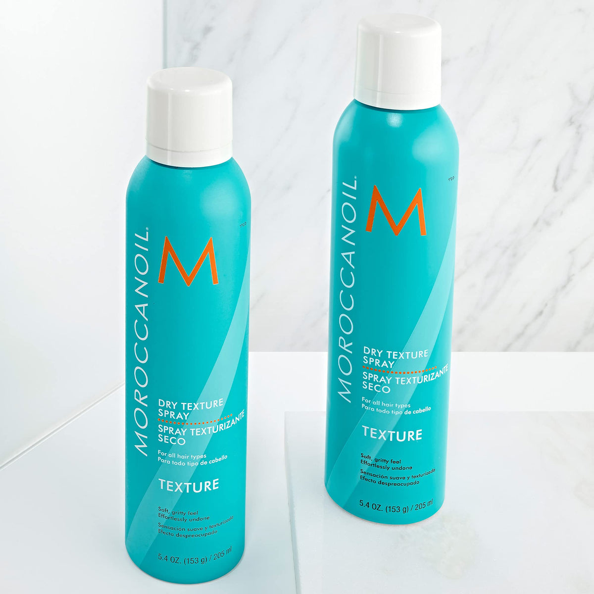 Moroccanoil Dry Texture Spray 5.4 Fl. Oz. with styling tools