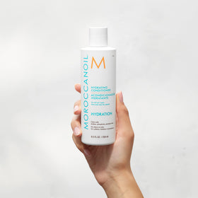 Moroccanoil Hydrating Conditioner 8.5 Fl Oz in bathroom setting