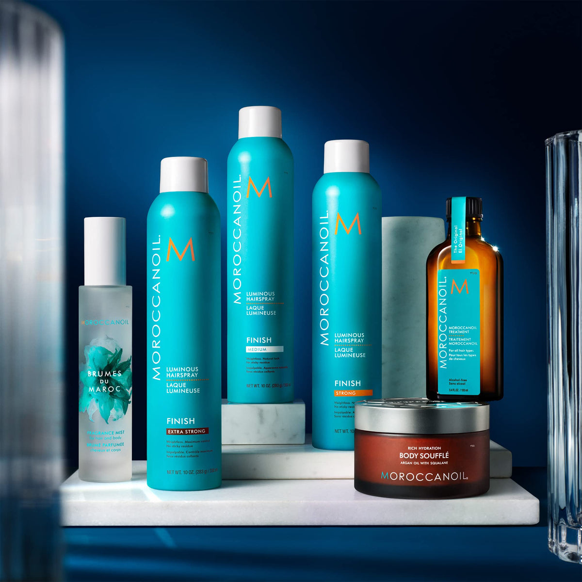 Moroccanoil Luminous Hairspray Extra Strong 10 Fl. Oz. on a vanity