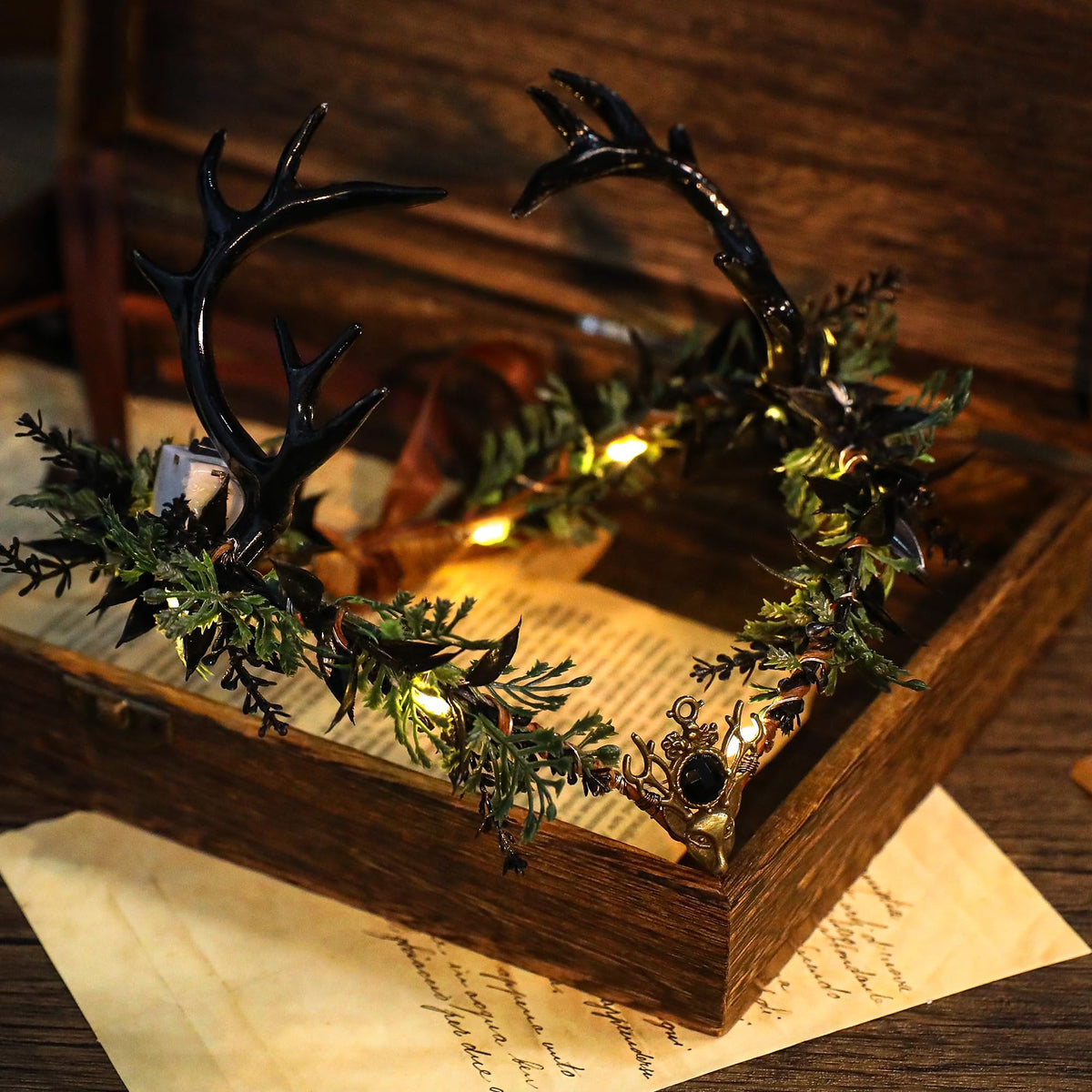 MOSTORY Light Up Elf Crown displayed on a decorative stand