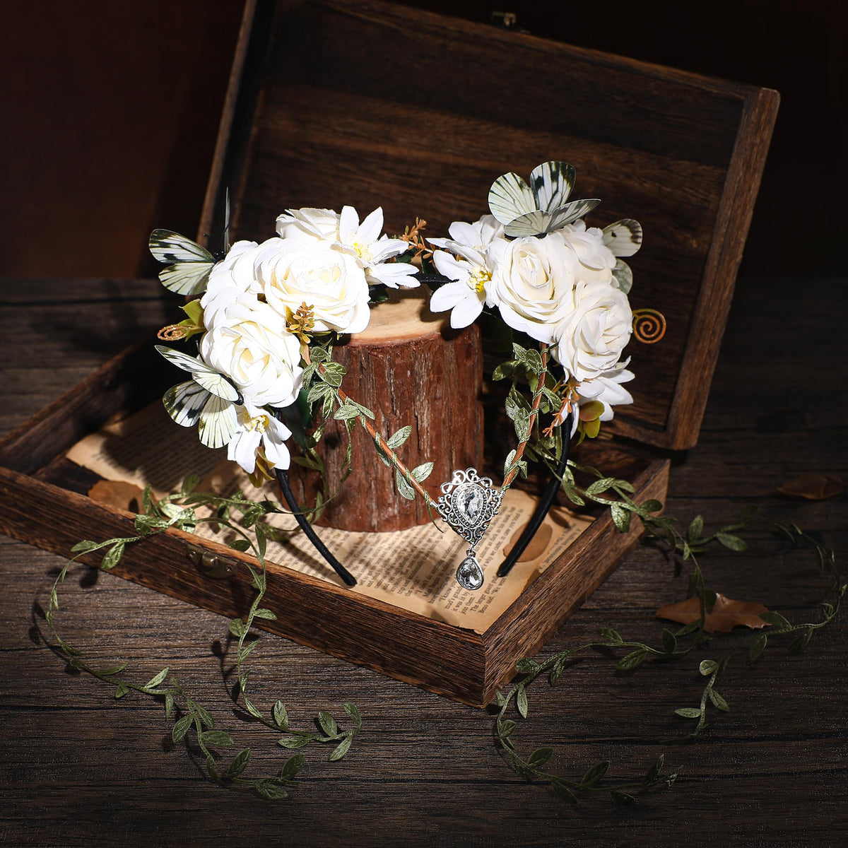 MOSTORY White Fairy Flower Crown displayed on a wooden surface