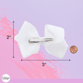 Motique Accessories Grosgrain Bow Clip set of 2 in packaging