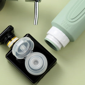 Mrsdry silicone bottles filled with shampoo and lotion