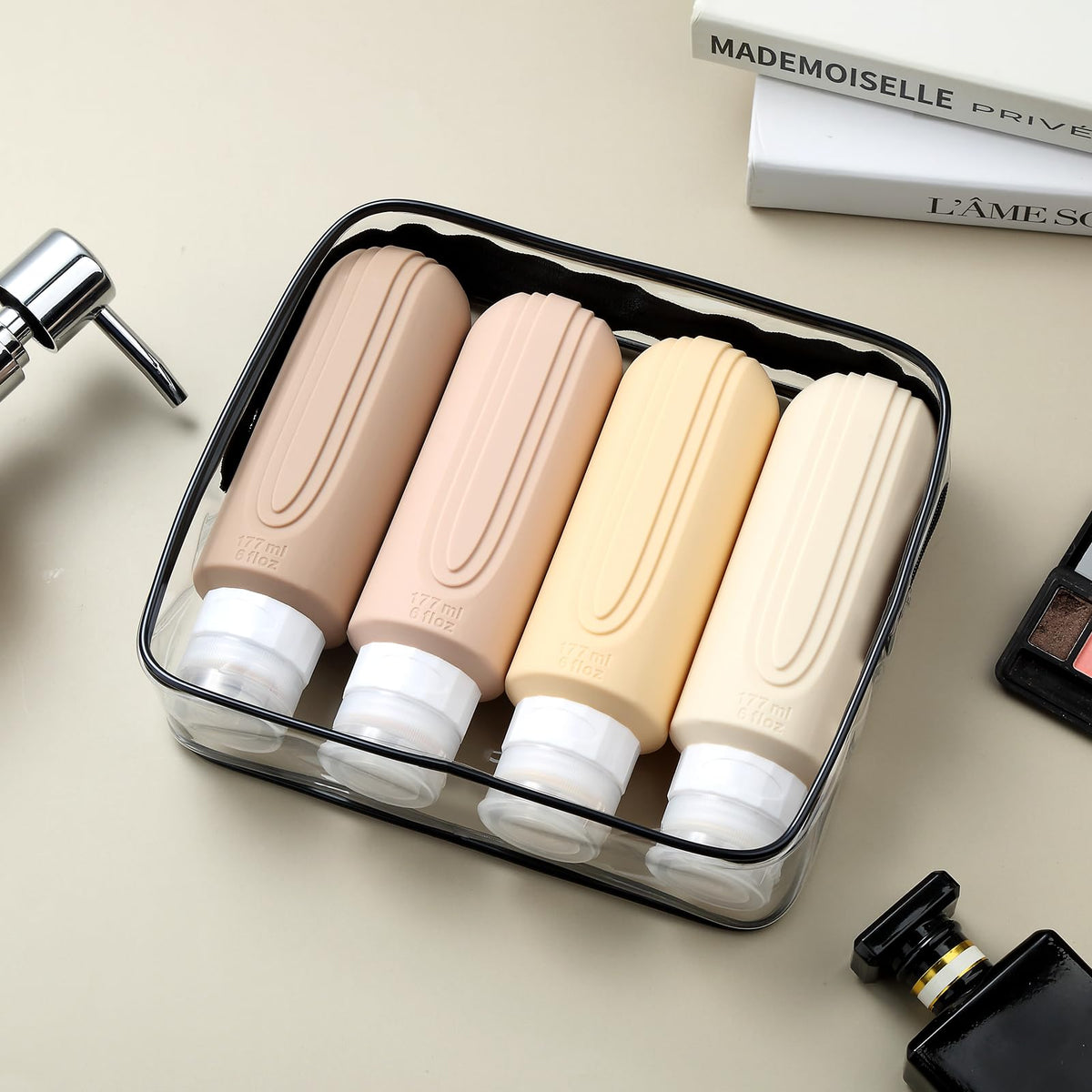 Mrsdry silicone travel bottles on a bathroom counter