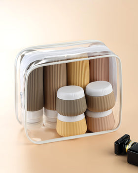 Mrsdry travel bottles arranged in clear makeup bag