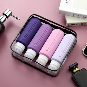 Mrsdry travel bottles displayed on a travel bag