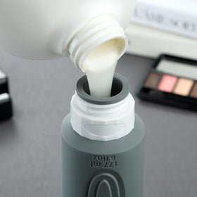 Mrsdry travel bottles showing refillable feature