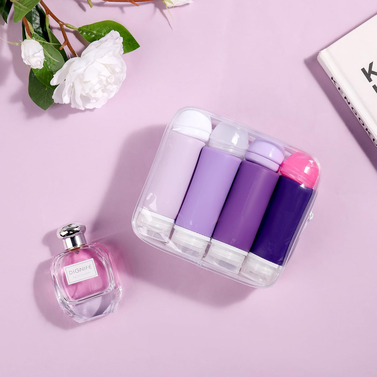 Muslish travel bottles set displayed on a travel suitcase