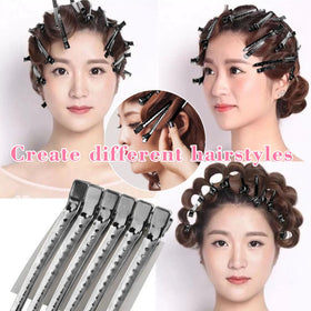 Mythos alligator clips in use during hair styling