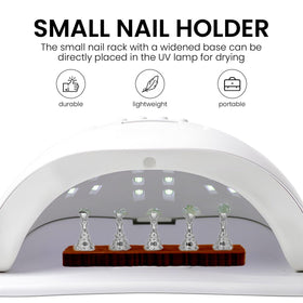 Nail stand set in use with UV lamp for drying nails