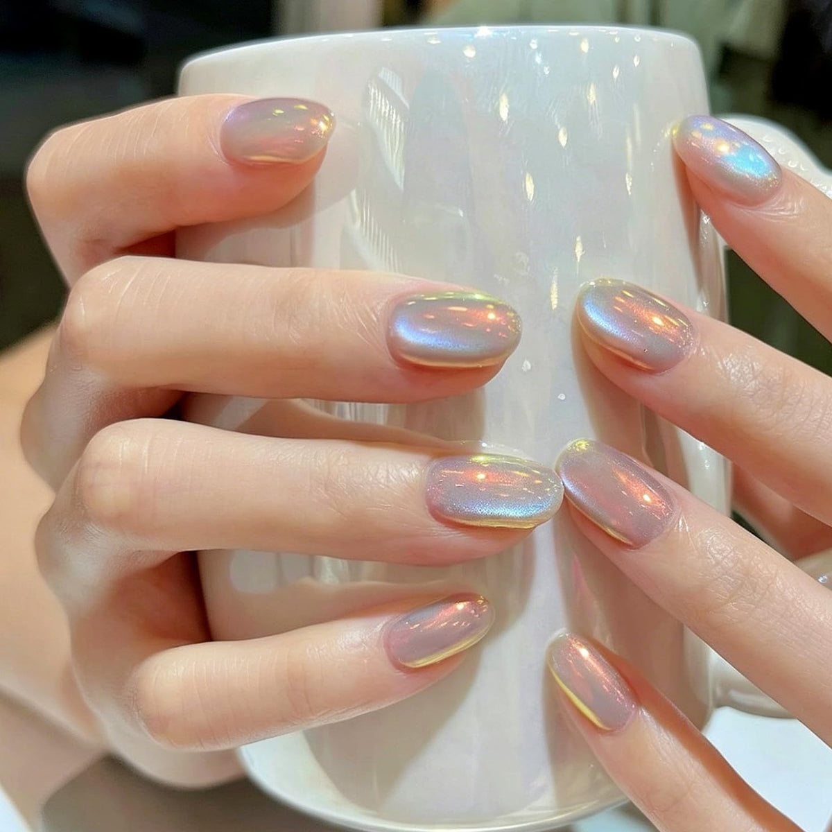 Nails showcasing mermaid chrome effect with Pretty Diva Powder