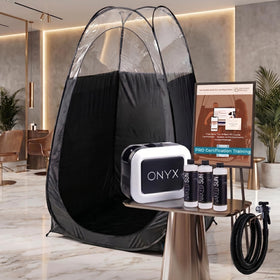Naked Sun XL Portable Spray Tan Tent in use during a tanning session