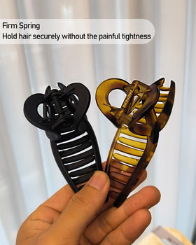 Nalodu 5 Inch Extra Large Claw Clips held in a hand for size reference