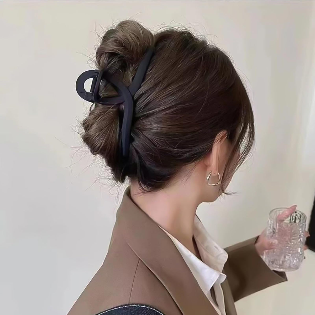 Nalodu hair claw clips on a travel bag for easy access