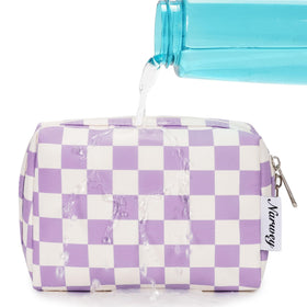 Narwey Small Checkered Makeup Bag in purple checkerboard pattern on a table