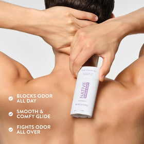 Native deodorant with fresh lilac and white tea background