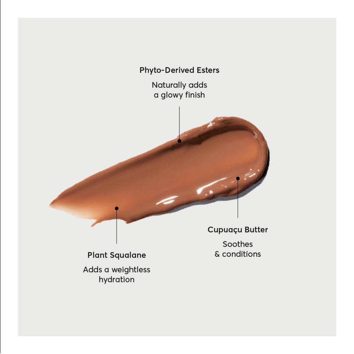 Naturium Phyto-Glow Lip Balm 0.34 oz Chai on a wooden surface