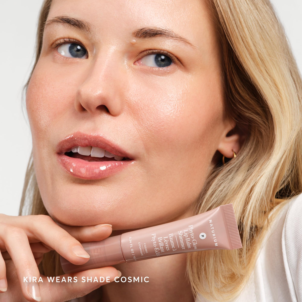 Naturium Phyto-Glow Lip Balm Shimmer Cosmic in hand